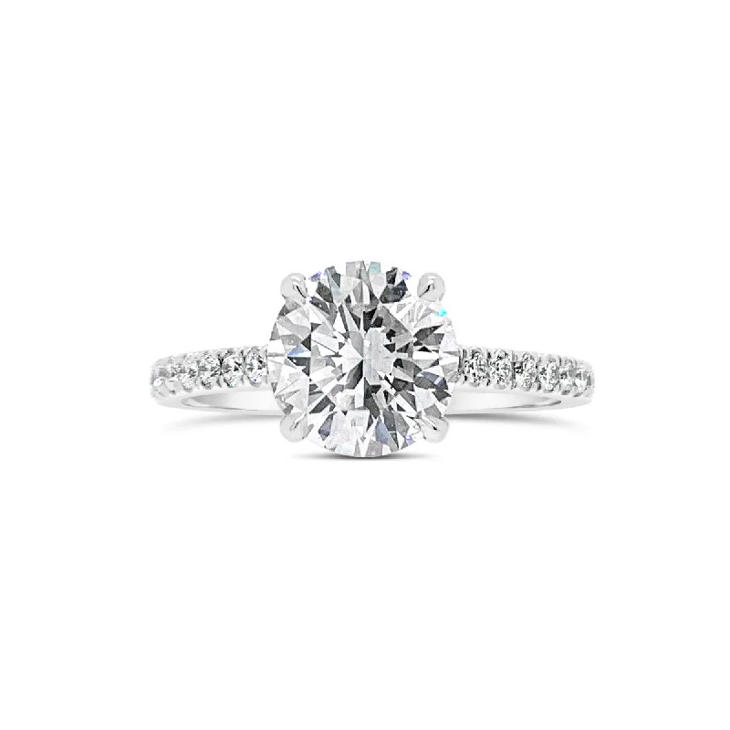 Classic Round Diamond Engagement Ring with Diamond Basket