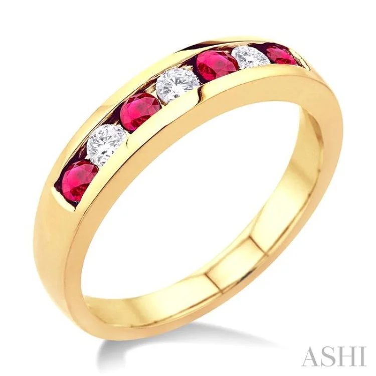 1/5 Ctw Channel Set Round Cut Diamond and 2.5 MM Round Cut Ruby Band in 14K Yellow Gold