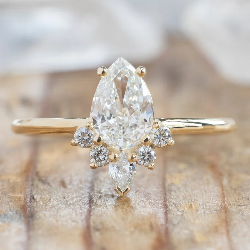 The Aster Ring | 0.71ct Pear Cut White Diamond in 14K Yellow Gold